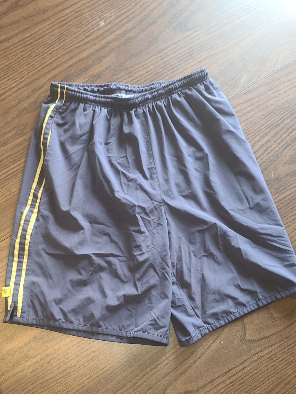Vintage Nike Men's Navy Athletic Shorts with Yellow Side Stripe Y2k Style Size L